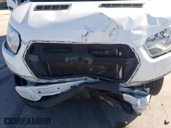 2020 Ford Transit Cargo with VIN 1FTBW3X89LKB13278, listed as a Copart auction lot 77077524 with 28,382 mi miles and Salvage Title. Bid and sale history available at DreamBid. Image 13.