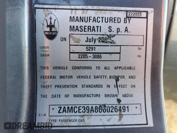 2006 Maserati Quattroporte z VIN ZAMCE39A860026491, wystawiony jako Copart lot #43785435 z przebiegiem 65 168 mil mil oraz Czysty tytuł • Clean title. Historia ofert i sprzedaży dostępna na DreamBid. Obrazek 13.
