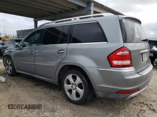 2012 Mercedes-Benz GL-Class GL 450 with VIN 4JGBF7BE6CA784588, listed as a Copart auction lot 74223144 with 293,636 mi miles and Salvage Title. Bid and sale history available at carsss.com. Image 2.