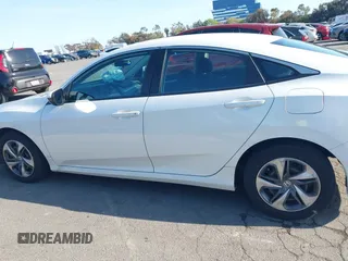 2019 Honda Civic Sedan LX with VIN 2HGFC2F62KH505921, listed as a IAAI auction lot 41982303 with 72,618 mi miles. Bid and sale history available at carsss.com. Image 14.