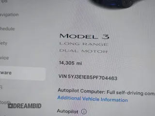 2023 Tesla Model 3 Long Range with VIN 5YJ3E1EB5PF704463, listed as a IAAI auction lot 41916627 with 14,305 mi miles and . Bid and sale history available at DreamBid. Image 7.