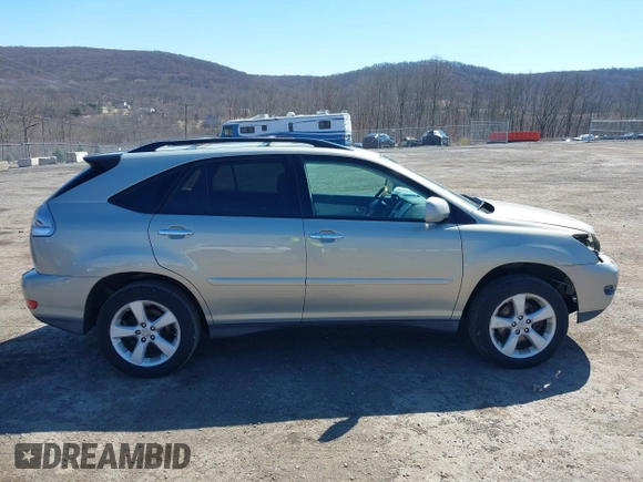 2008 Lexus RX with VIN 2T2HK31U98C071341, listed as a IAAI auction lot 41829229 with 166,031 mi miles. Bid and sale history available at carsss.com. Image 13.