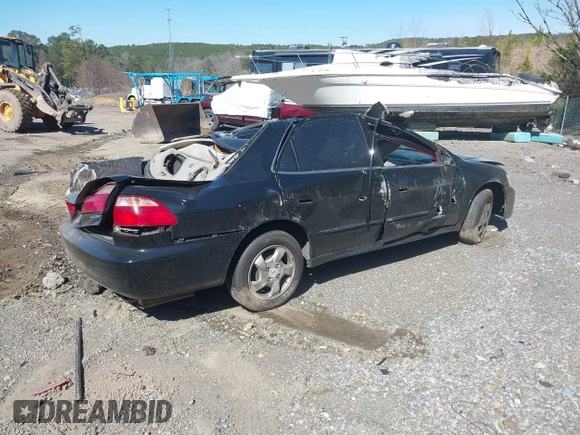 2002 Honda Accord LX with VIN 1HGCG56422A010978, listed as a IAAI auction lot 41639059 with 386,221 mi miles and . Bid and sale history available at DreamBid. Image 4.