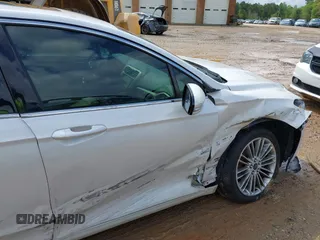 2015 Ford Fusion SE with VIN 3FA6P0HD9FR123677, listed as a IAAI auction lot 42021493 with 166,446 mi miles and . Bid and sale history available at DreamBid. Image 6.