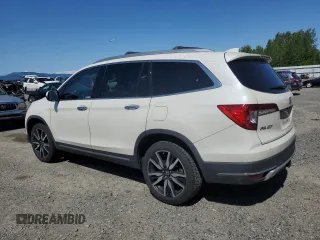2019 Honda Pilot Touring 7-Passenger with VIN 5FNYF6H67KB024507, listed as a Copart auction lot 59041095 with 85,133 mi miles and Salvage title. Bid and sale history available at DreamBid. Image 2.