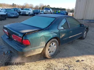 1995 Ford Thunderbird LX with VIN 1FALP62W3SH191775, listed as a IAAI auction lot 41250513 with 150,743 mi miles. Bid and sale history available at carsss.com. Image 4.