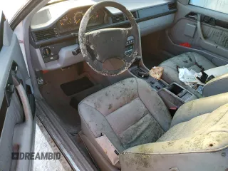 1995 Mercedes-Benz E Class with VIN WDBEA66E0SC275229, listed as a Copart auction lot 77391894 with 64,025 mi miles and Salvage Title. Bid and sale history available at carsss.com. Image 8.