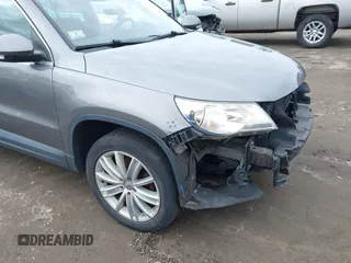 2011 Volkswagen Tiguan SE with VIN WVGBV7AX4BW532524, listed as a IAAI auction lot 41757552 with 141,115 mi miles and . Bid and sale history available at DreamBid. Image 13.