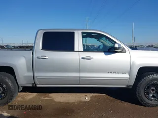 2018 Chevrolet Silverado 1500 LT with VIN 3GCPCREC9JG574686, listed as a IAAI auction lot 41676124 with 74,239 mi miles and . Bid and sale history available at DreamBid. Image 13.