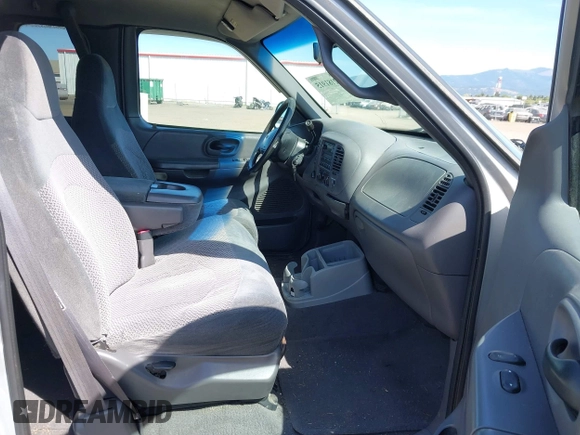 1999 Ford F-150 XL with VIN 2FTRX18LXXCA77730, listed as a IAAI auction lot 42181915 with 240,164 mi miles and . Bid and sale history available at DreamBid. Image 5.