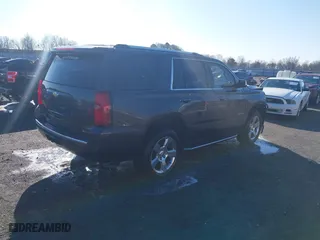 2018 Chevrolet Tahoe Premier with VIN 1GNSCCKC5JR204676, listed as a IAAI auction lot 41731192 with 130,528 mi miles. Bid and sale history available at carsss.com. Image 4.