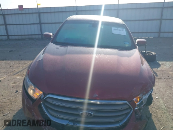 2014 Ford Taurus SEL with VIN 1FAHP2E80EG159131, listed as a IAAI auction lot 42004296 with 140,213 mi miles and . Bid and sale history available at DreamBid. Image 13.