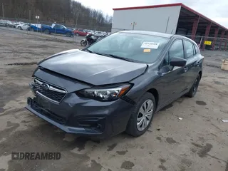 2019 Subaru Impreza with VIN 4S3GTAA60K3758517, listed as a IAAI auction lot 41930668 with 39,999 mi miles. Bid and sale history available at carsss.com. Image 2.