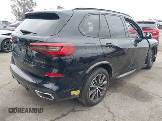 2022 BMW X5 xDrive45e with VIN 5UXTA6C08N9L09645, listed as a IAAI auction lot 41454157 with 31,149 mi miles. Bid and sale history available at carsss.com. Image 4.