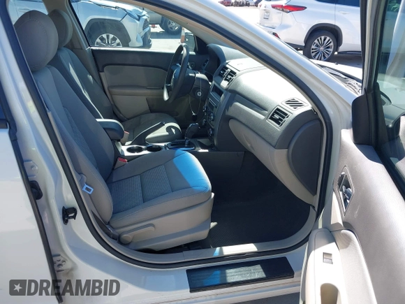 2012 Ford Fusion S with VIN 3FAHP0GA0CR137074, listed as a IAAI auction lot 41756162 with 165,205 mi miles. Bid and sale history available at carsss.com. Image 5.