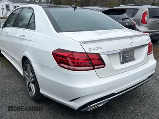 2016 Mercedes-Benz E-Class E 400 with VIN WDDHF6HB4GB200197, listed as a Copart auction lot 82809674 with 89,649 mi miles and Clean Title. Bid and sale history available at carsss.com. Image 4.