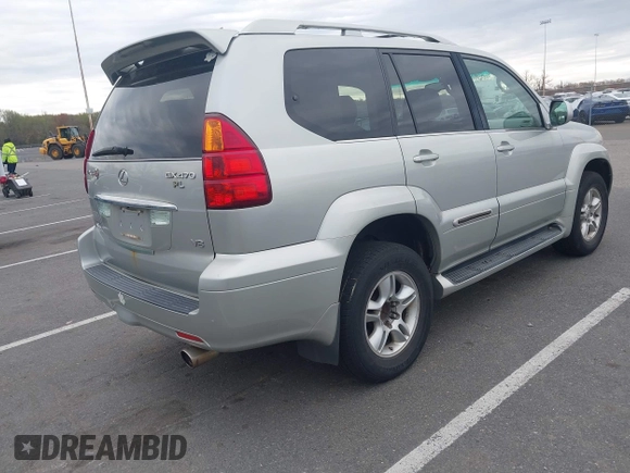 2004 Lexus GX with VIN JTJBT20X240063922, listed as a IAAI auction lot 42087170 with 251,366 mi miles. Bid and sale history available at carsss.com. Image 4.