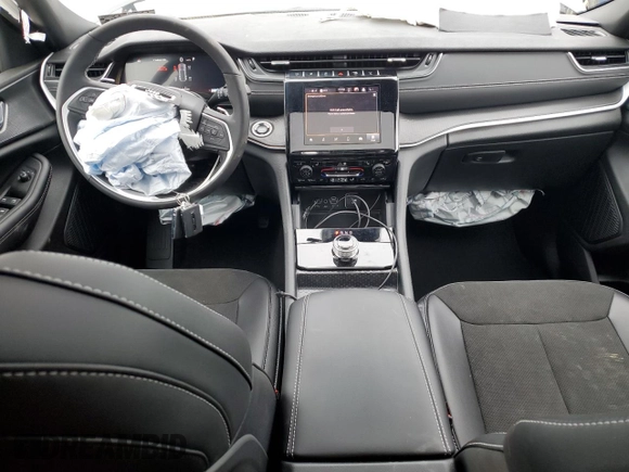 2025 Jeep Grand Cherokee Laredo with VIN 1C4RJHAG4SC272275, listed as a Copart auction lot 79920004 with 712 mi miles and Salvage Title. Bid and sale history available at DreamBid. Image 8.