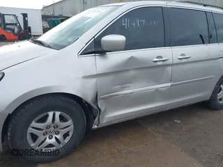 2006 Honda Odyssey EX-L z VIN 5FNRL38766B018014, wystawiony jako IAAI lot #41497144 z przebiegiem 230 225 mil mil oraz . Historia ofert i sprzedaży dostępna na DreamBid. Obrazek 6.