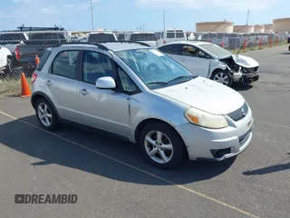 2009 Suzuki SX4 Man FWD with VIN JS2YA413396201567, listed as a IAAI auction lot 41567377 with 110,894 mi miles. Bid and sale history available at carsss.com. Image 1.