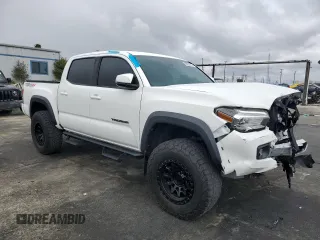 2021 Toyota Tacoma 4WD SR with VIN 3TMCZ5AN5MM431429, listed as a Copart auction lot 48203175 with 22,108 mi miles and Salvage Title. Bid and sale history available at carsss.com. Image 4.
