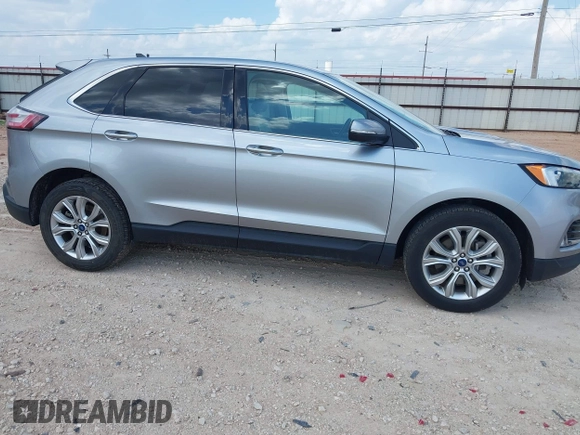 2022 Ford Edge Titanium with VIN 2FMPK4K99NBB06136, listed as a IAAI auction lot 42733977 with 57,794 mi miles and . Bid and sale history available at DreamBid. Image 13.