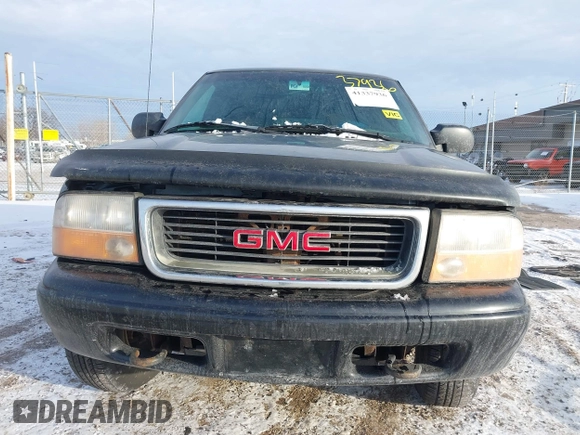 1999 GMC Jimmy SLE with VIN 1GKDT13W5X2520020, listed as a IAAI auction lot 41337936 with 277,615 mi miles. Bid and sale history available at carsss.com. Image 12.