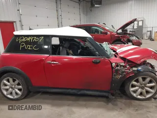 2006 MINI Hardtop S with VIN WMWRE33536TL20807, listed as a IAAI auction lot 42049707 with Not provided miles and . Bid and sale history available at DreamBid. Image 13.