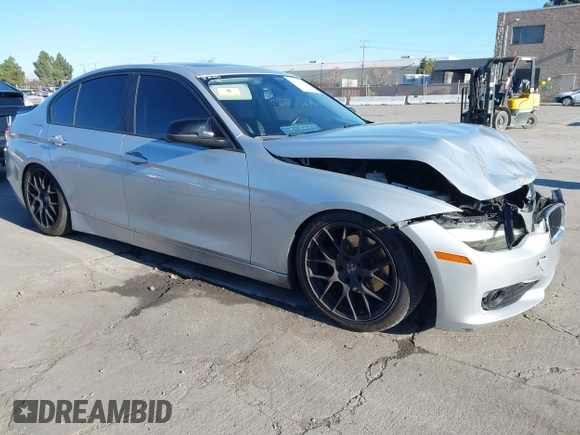 2015 BMW 3 Series 328i with VIN WBA3A5C57FF609054, listed as a IAAI auction lot 41330498 with 129,378 mi miles. Bid and sale history available at carsss.com. Image 1.