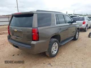 2015 Chevrolet Tahoe LT z VIN 1GNSCBKC2FR685780, wystawiony jako IAAI lot #42354130 z przebiegiem 101 617 mil mil oraz . Historia ofert i sprzedaży dostępna na DreamBid. Obrazek 4.
