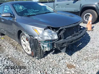 2014 Nissan Maxima S with VIN 1N4AA5AP0EC446851, listed as a IAAI auction lot 42016439 with 150,379 mi miles and . Bid and sale history available at DreamBid. Image 14.