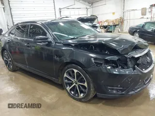 2015 Ford Taurus SHO z VIN 1FAHP2KT7FG188362, wystawiony jako IAAI lot #42313534 z przebiegiem 88 415 mil mil oraz . Historia ofert i sprzedaży dostępna na DreamBid. Obrazek 1.