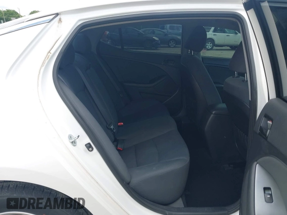 2015 Kia Optima LX with VIN KNAGM4A74F5653459, listed as a IAAI auction lot 42443188 with 109,129 mi miles and . Bid and sale history available at DreamBid. Image 8.