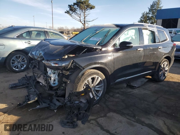 2021 Cadillac XT6 Premium Luxury z VIN 1GYKPCRS5MZ110015, wystawiony jako Copart lot #49323935 z przebiegiem 28 453 mil mil oraz Czysty tytuł • Clean title. Historia ofert i sprzedaży dostępna na DreamBid. Obrazek 1.