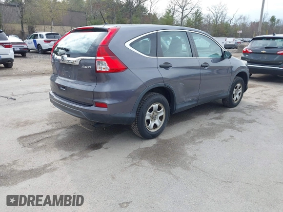 2015 Honda CR-V LX with VIN 5J6RM4H34FL031089, listed as a IAAI auction lot 42123159 with 74,566 mi miles and . Bid and sale history available at DreamBid. Image 4.