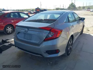 2020 Honda Civic Sedan LX with VIN 19XFC2F66LE012660, listed as a IAAI auction lot 41706100 with 63,494 mi miles. Bid and sale history available at carsss.com. Image 4.