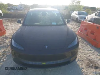 2025 Tesla Model 3 Long Range with VIN 5YJ3E1EAXSF974949, listed as a IAAI auction lot 41934237 with 260 mi miles and . Bid and sale history available at carsss.com. Image 6.