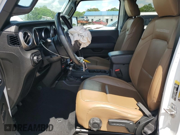 2020 Jeep Wrangler Unlimited Rubicon with VIN 1C4HJXFG3LW184249, listed as a Copart auction lot 56423665 with 63,111 mi miles and Salvage title. Bid and sale history available at DreamBid. Image 7.