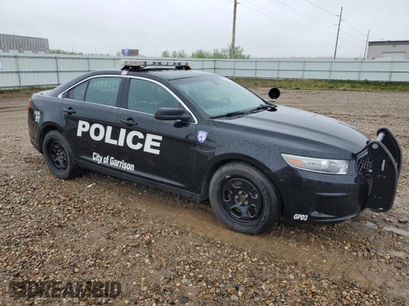 2014 Ford Police Interceptor with VIN 1FAHP2MT9EG111729, listed as a Copart auction lot 56947315 with 74,887 mi miles and Salvage title. Bid and sale history available at DreamBid. Image 4.