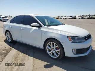 2014 Volkswagen Jetta GLI Edition 30 with VIN 3VW4S7AJXEM336252, listed as a Copart auction lot 72886814 with 121,728 mi miles and Salvage title. Bid and sale history available at DreamBid. Image 4.