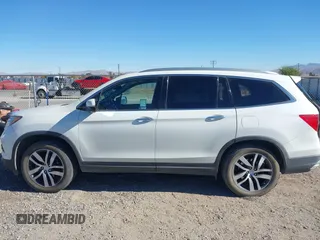 2018 Honda Pilot Touring z VIN 5FNYF6H98JB032821, wystawiony jako IAAI lot #41012077 z przebiegiem 110 321 mil mil oraz . Historia ofert i sprzedaży dostępna na DreamBid. Obrazek 14.