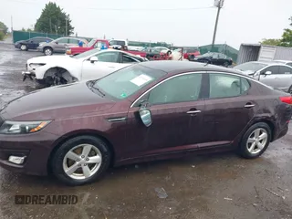 2014 Kia Optima LX z VIN 5XXGM4A73EG270576, wystawiony jako IAAI lot #42335343 z przebiegiem 207 000 mil mil oraz . Historia ofert i sprzedaży dostępna na DreamBid. Obrazek 14.
