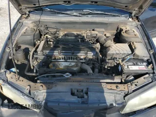 2004 Hyundai Elantra GLS z VIN KMHDN46D94U917890, wystawiony jako Copart lot #60000025 z przebiegiem 158 474 mil mil oraz Czysty tytuł • Clean title. Historia ofert i sprzedaży dostępna na DreamBid. Obrazek 11.