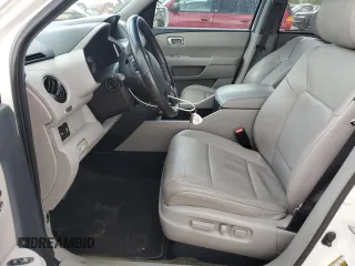 2013 Honda Pilot Touring z VIN 5FNYF4H91DB062722, wystawiony jako Copart lot #58308165 z przebiegiem 130 896 mil mil oraz Szkoda całkowita • Salvage title. Historia ofert i sprzedaży dostępna na DreamBid. Obrazek 7.