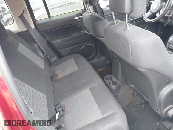 2013 Jeep Patriot Latitude with VIN 1C4NJPFA3DD237804, listed as a IAAI auction lot 41876591 with 73,852 mi miles. Bid and sale history available at carsss.com. Image 8.