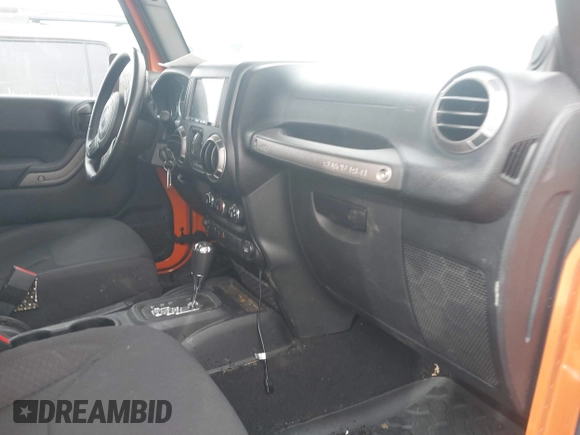 2013 Jeep Wrangler Unlimited Sport z VIN 1C4BJWDG7DL522421, wystawiony jako IAAI lot #41492425 z przebiegiem 55 921 mil mil oraz . Historia ofert i sprzedaży dostępna na DreamBid. Obrazek 5.
