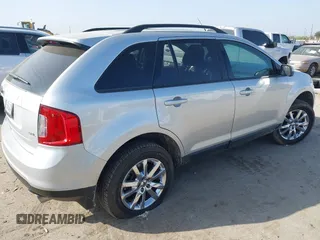 2013 Ford Edge SEL with VIN 2FMDK3JC3DBE33138, listed as a IAAI auction lot 41793707 with 119,115 mi miles. Bid and sale history available at carsss.com. Image 4.