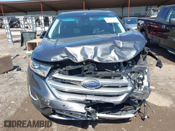 2015 Ford Edge Titanium z VIN 2FMPK4K83FBB30411, wystawiony jako IAAI lot #42230235 z przebiegiem 69 094 mil mil oraz . Historia ofert i sprzedaży dostępna na DreamBid. Obrazek 13.