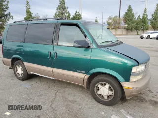 2000 Chevrolet Astro with VIN 1GNDM19W9YB191640, listed as a Copart auction lot 82247164 with 168,605 mi miles and Salvage Title. Bid and sale history available at carsss.com. Image 4.