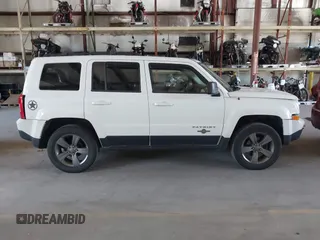 2014 Jeep Patriot Latitude with VIN 1C4NJRFB1ED687912, listed as a IAAI auction lot 42577920 with 150,327 mi miles and . Bid and sale history available at DreamBid. Image 14.